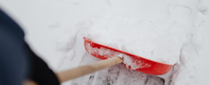 Grounds maintenance team gritting car park in Manchester