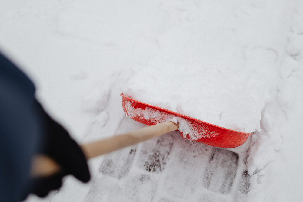 Grounds maintenance team gritting car park in Manchester
